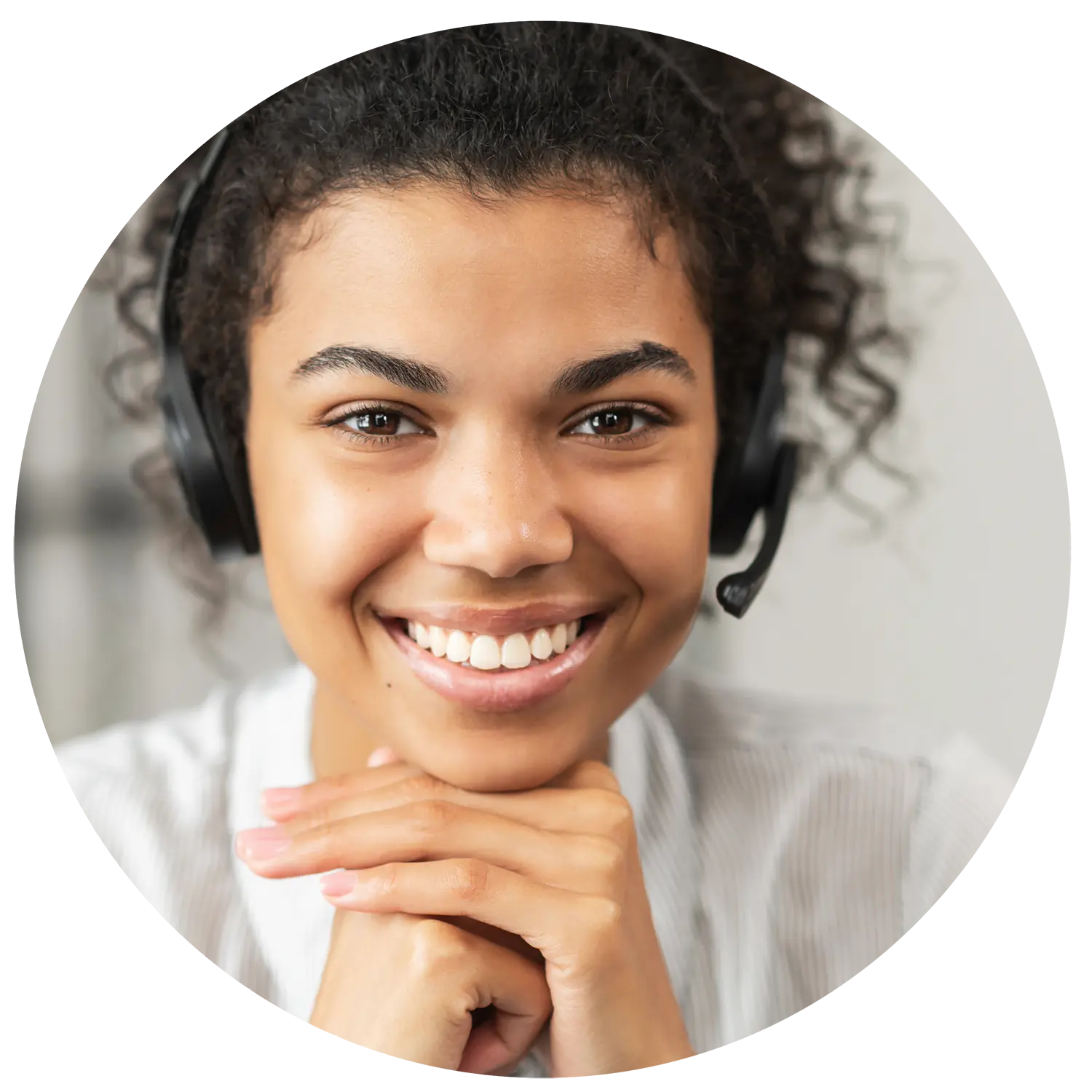 Photo of a smiling customer service representative providing excellent service.