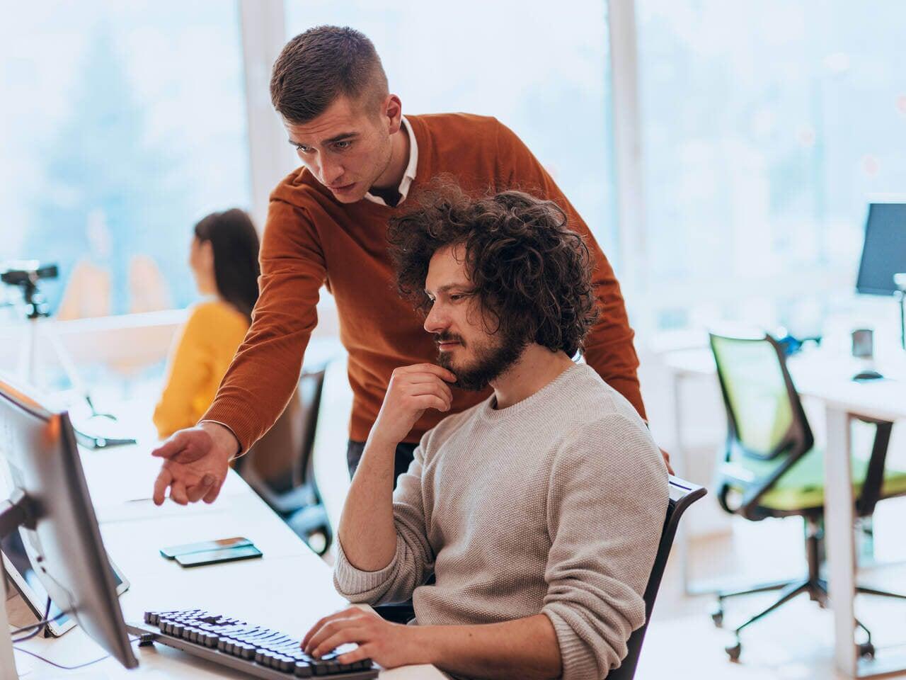 company employees discussing a project