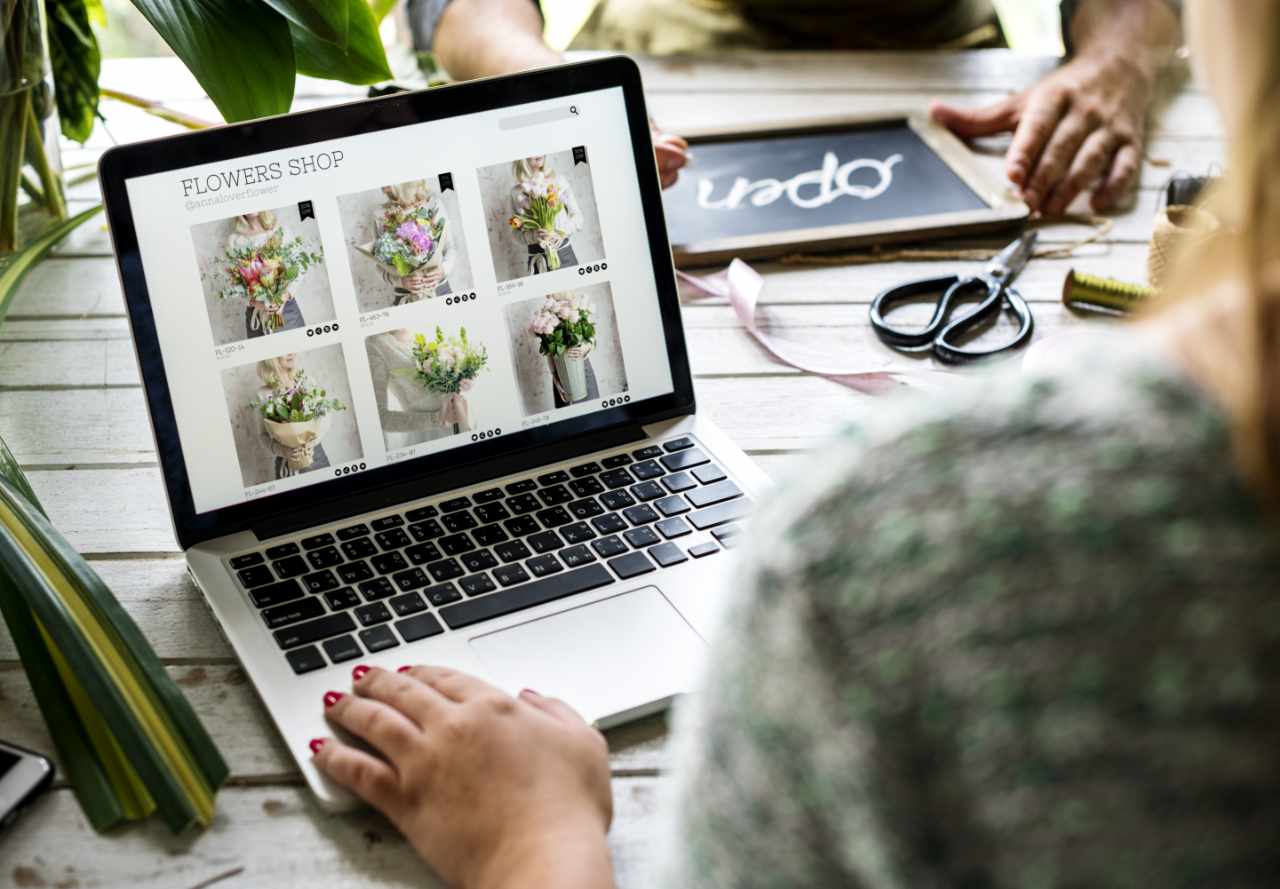 flower shop owner promoting business online