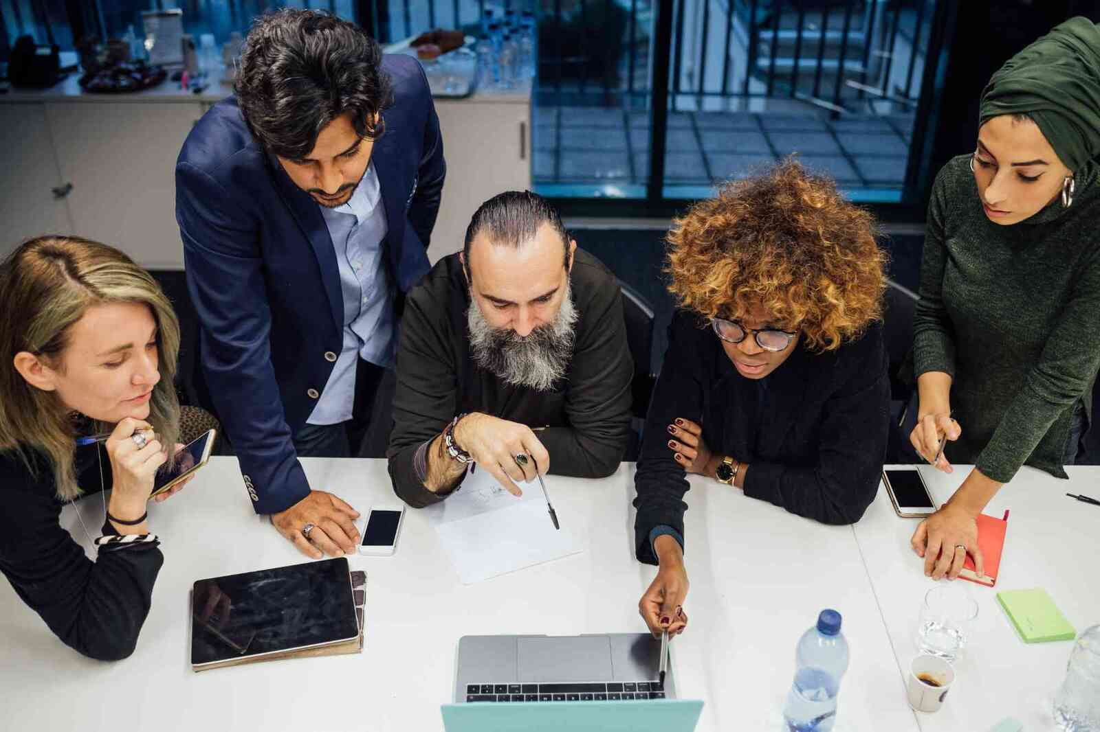 manager meeting with employees at the office